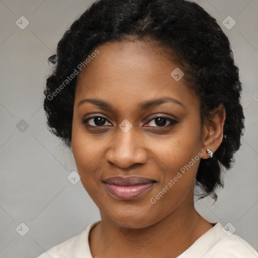 Joyful black young-adult female with medium  black hair and brown eyes