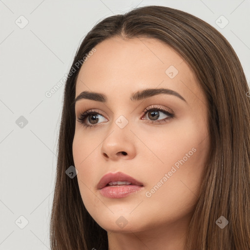 Neutral white young-adult female with long  brown hair and brown eyes