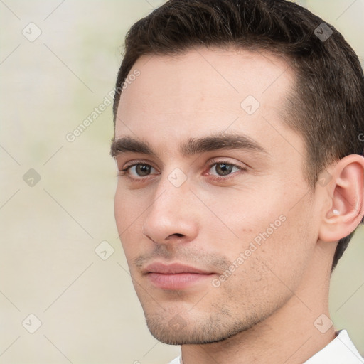 Neutral white young-adult male with short  brown hair and brown eyes