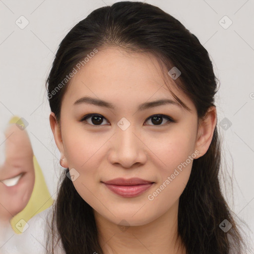 Joyful white young-adult female with long  brown hair and brown eyes