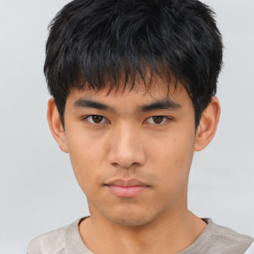 Neutral asian young-adult male with short  brown hair and brown eyes