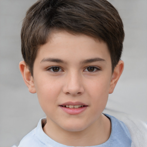 Joyful white child male with short  brown hair and brown eyes