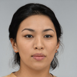 Neutral asian young-adult female with medium  black hair and brown eyes