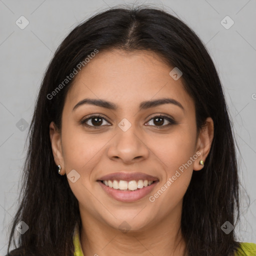 Joyful latino young-adult female with long  brown hair and brown eyes