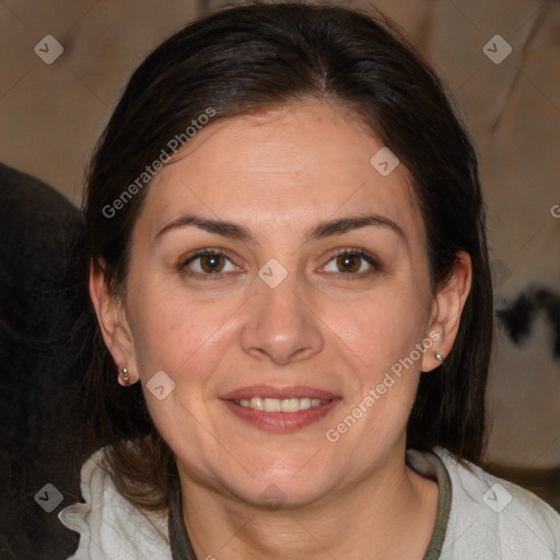 Joyful white adult female with medium  brown hair and brown eyes