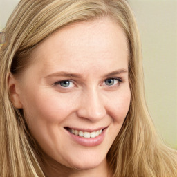 Joyful white young-adult female with long  brown hair and blue eyes