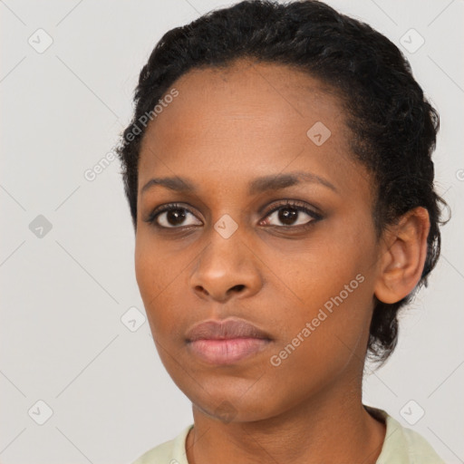 Neutral black young-adult female with short  black hair and brown eyes