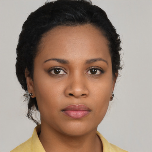 Neutral latino young-adult female with short  black hair and brown eyes