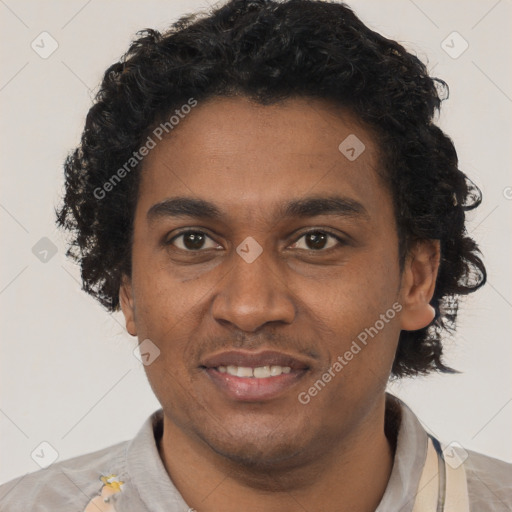Joyful black young-adult male with short  brown hair and brown eyes