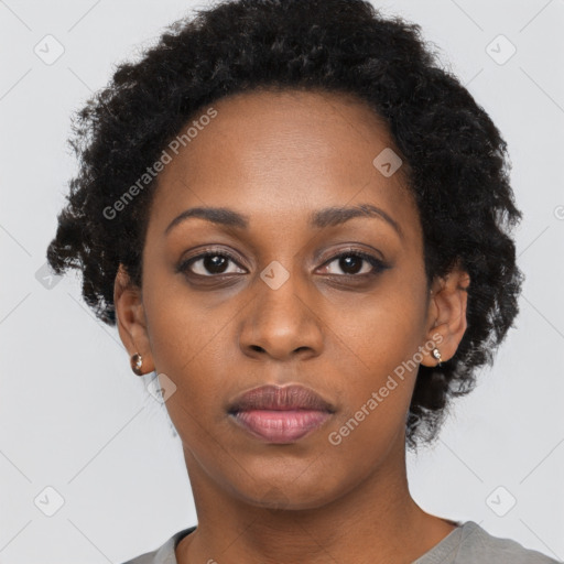 Neutral black young-adult female with short  black hair and brown eyes