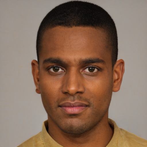Neutral black young-adult male with short  brown hair and brown eyes