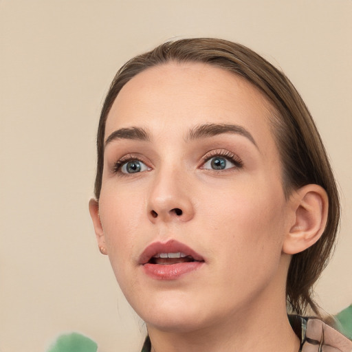 Neutral white young-adult female with medium  brown hair and grey eyes