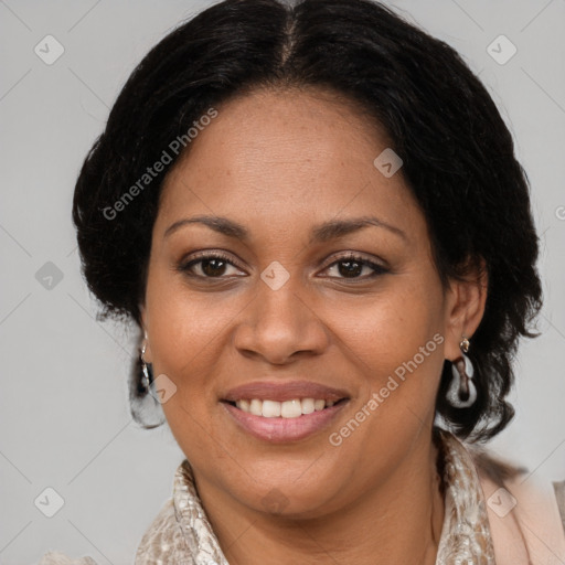 Joyful black adult female with medium  brown hair and brown eyes