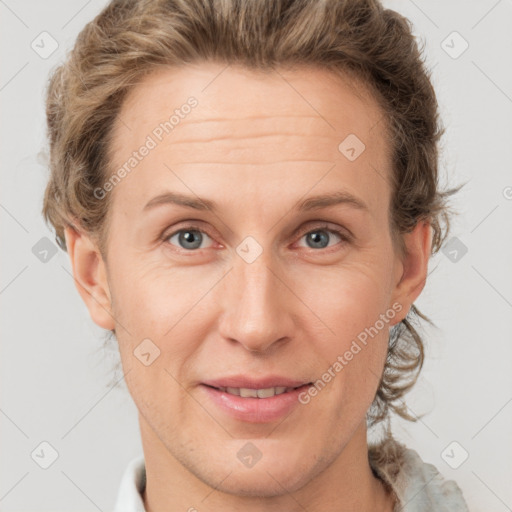 Joyful white adult female with short  brown hair and grey eyes