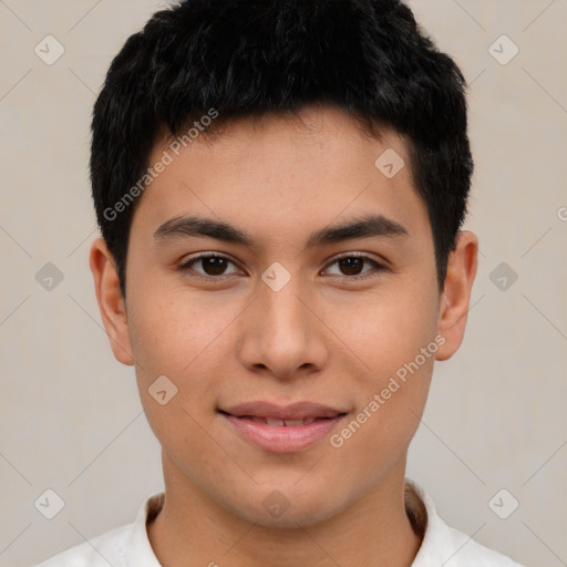 Joyful asian young-adult male with short  brown hair and brown eyes