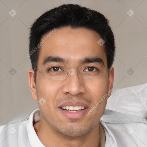 Joyful white young-adult male with short  black hair and brown eyes