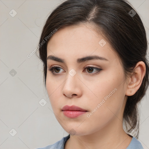 Neutral white young-adult female with medium  brown hair and brown eyes