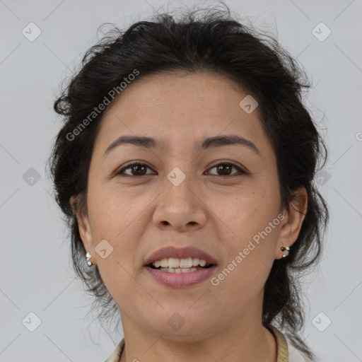 Joyful asian adult female with medium  brown hair and brown eyes