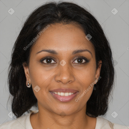 Joyful black young-adult female with medium  brown hair and brown eyes