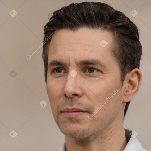 Neutral white adult male with short  brown hair and brown eyes