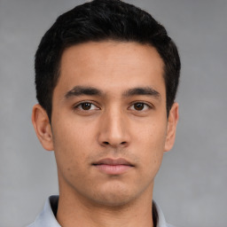 Neutral asian young-adult male with short  black hair and brown eyes