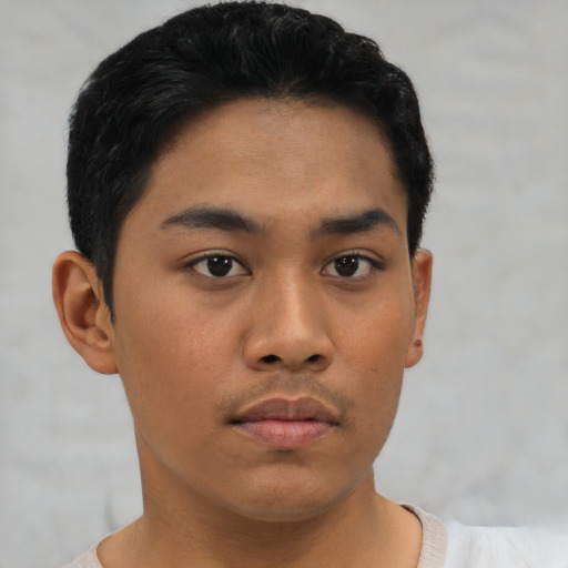 Neutral asian young-adult male with short  black hair and brown eyes