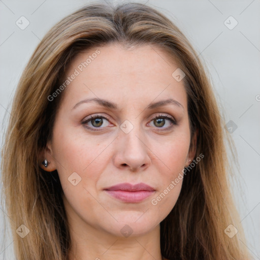 Joyful white young-adult female with long  brown hair and green eyes