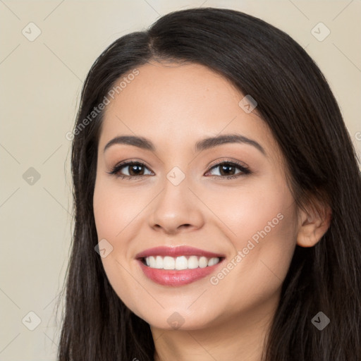 Joyful white young-adult female with long  black hair and brown eyes