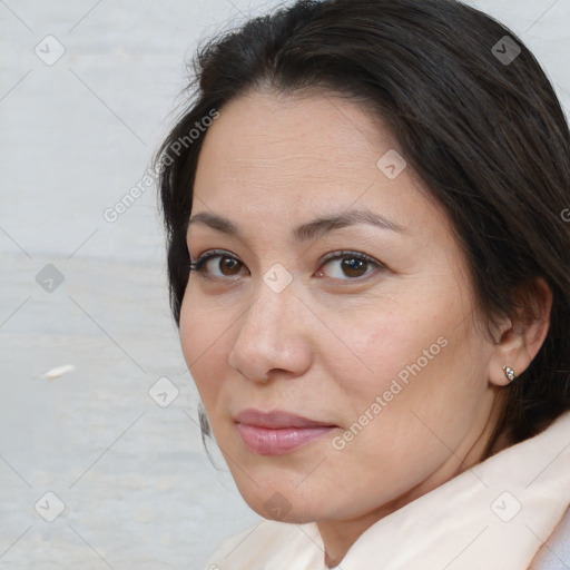 Joyful white adult female with medium  brown hair and brown eyes