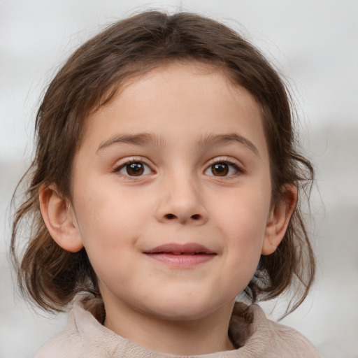 Joyful white child female with medium  brown hair and brown eyes