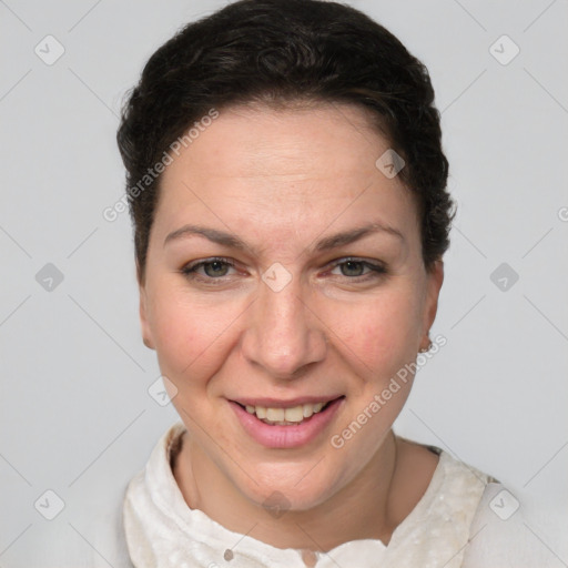 Joyful white adult female with short  brown hair and grey eyes