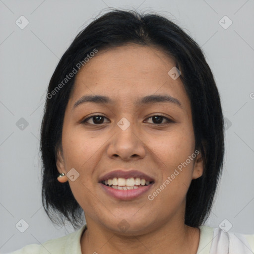 Joyful asian young-adult female with long  brown hair and brown eyes