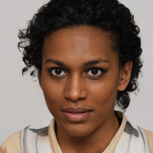 Neutral black young-adult female with medium  black hair and brown eyes