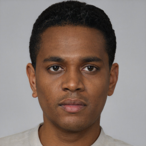 Neutral black young-adult male with short  black hair and brown eyes