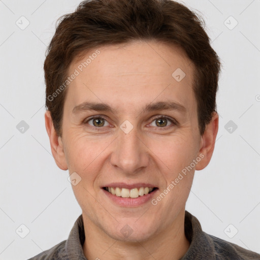 Joyful white adult male with short  brown hair and grey eyes