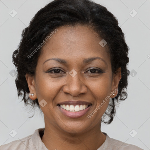 Joyful black young-adult female with medium  brown hair and brown eyes