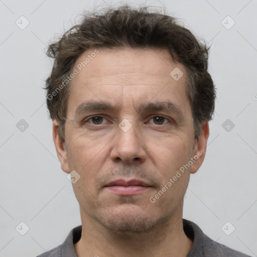 Neutral white adult male with short  brown hair and brown eyes