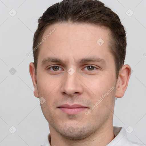 Neutral white young-adult male with short  brown hair and grey eyes