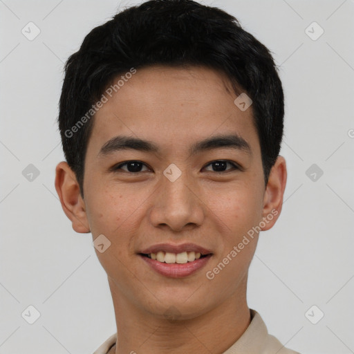 Joyful asian young-adult male with short  black hair and brown eyes