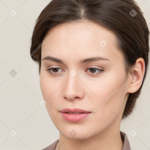 Neutral white young-adult female with medium  brown hair and brown eyes