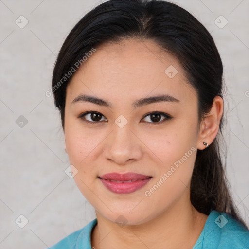 Joyful asian young-adult female with medium  brown hair and brown eyes