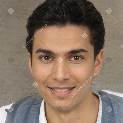 Joyful white young-adult male with short  black hair and brown eyes