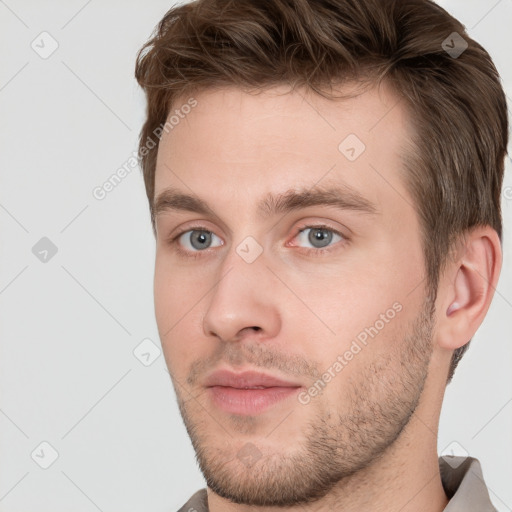 Neutral white young-adult male with short  brown hair and grey eyes