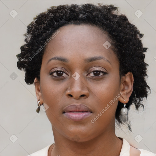 Neutral black young-adult female with short  brown hair and brown eyes