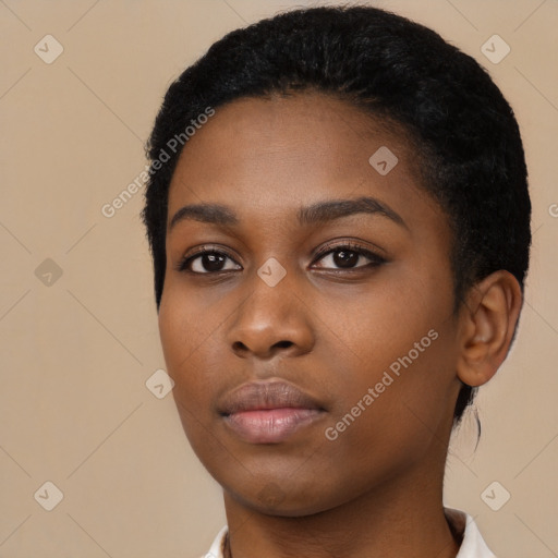 Neutral black young-adult female with short  black hair and brown eyes