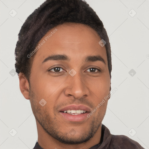 Joyful latino young-adult male with short  brown hair and brown eyes