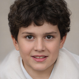 Joyful white child male with short  brown hair and brown eyes