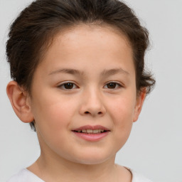 Joyful white child female with short  brown hair and brown eyes