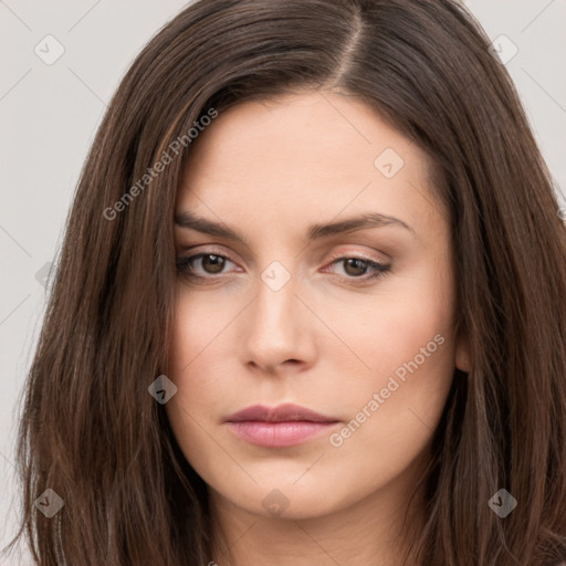 Neutral white young-adult female with long  brown hair and brown eyes