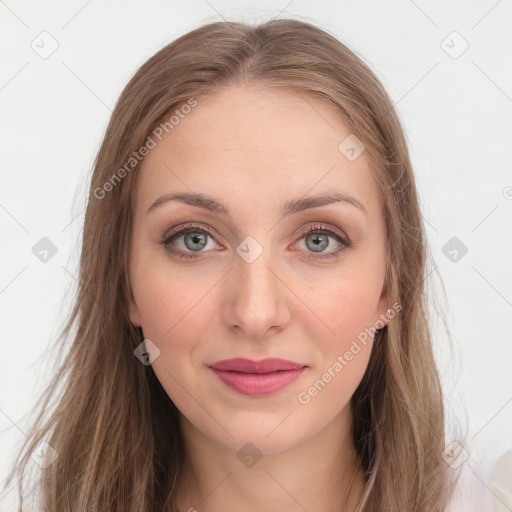 Joyful white young-adult female with long  brown hair and blue eyes